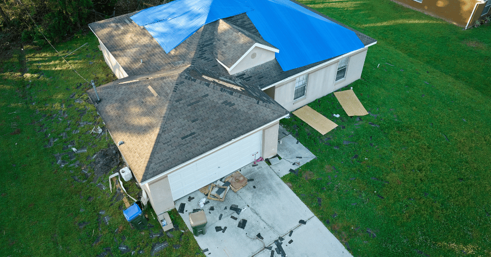 Storm Damage Repair Companies Louisville KY - house with damaged roof